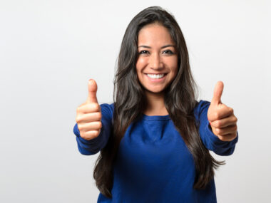 SPHERES registry for NMOSD | Neuromyelitis News | woman giving two thumb's up