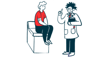 A doctor talks to a patient who is sitting on an examination table.