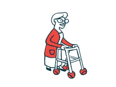 An elderly woman uses a walker to aid mobility.