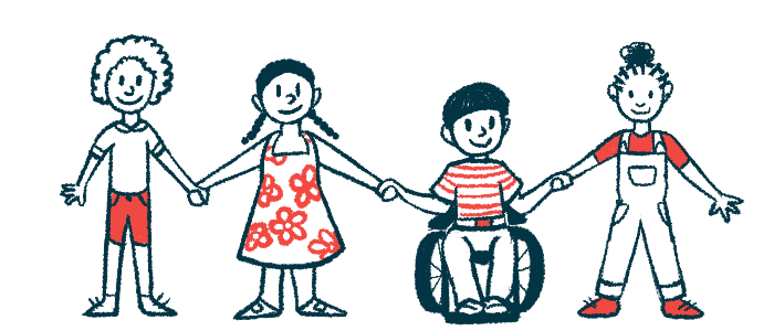 Children, including one in a wheelchair, are pictured in a row, holding hands.
